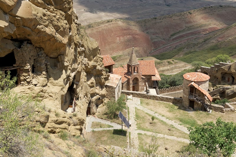The cave monastery complex of Davit Gareja carved into sandstone cliffs in southeastern Georgia