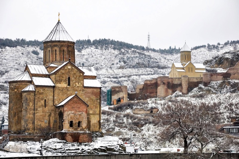 A mountain monastery dusted with snow