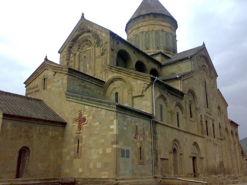 A domed cathedral behind ancient walls at Mtskheta, Georgia's old capital